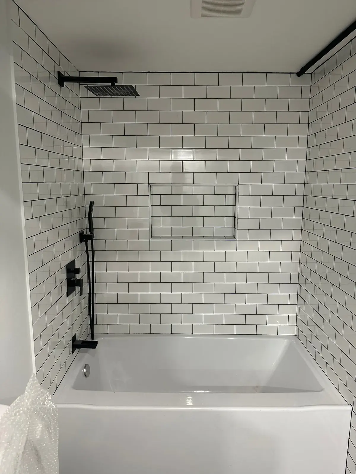 White subway tile bathroom work